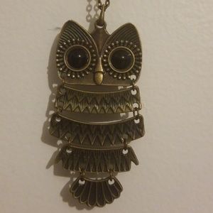Flexible owl pendant